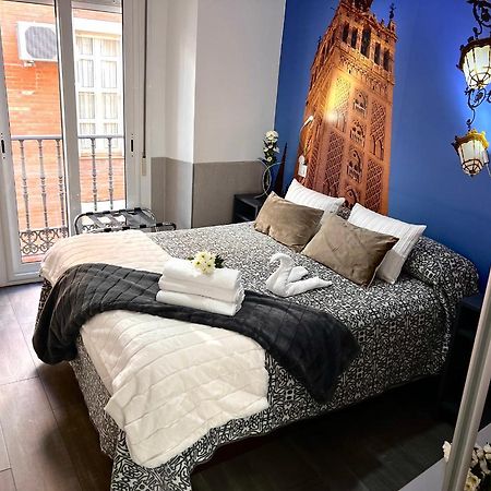 塞维利亚 帕科斯旅馆酒店 外观 照片 A bedroom at the hotel