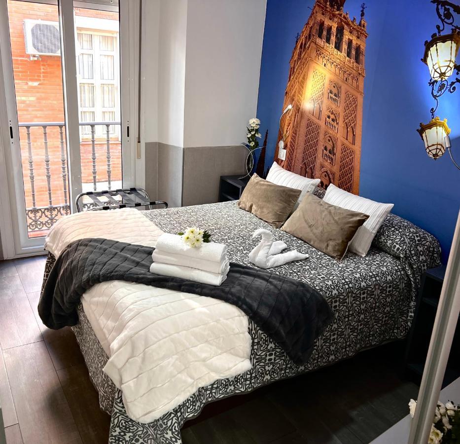 塞维利亚 帕科斯旅馆酒店 外观 照片 A bedroom at the hotel