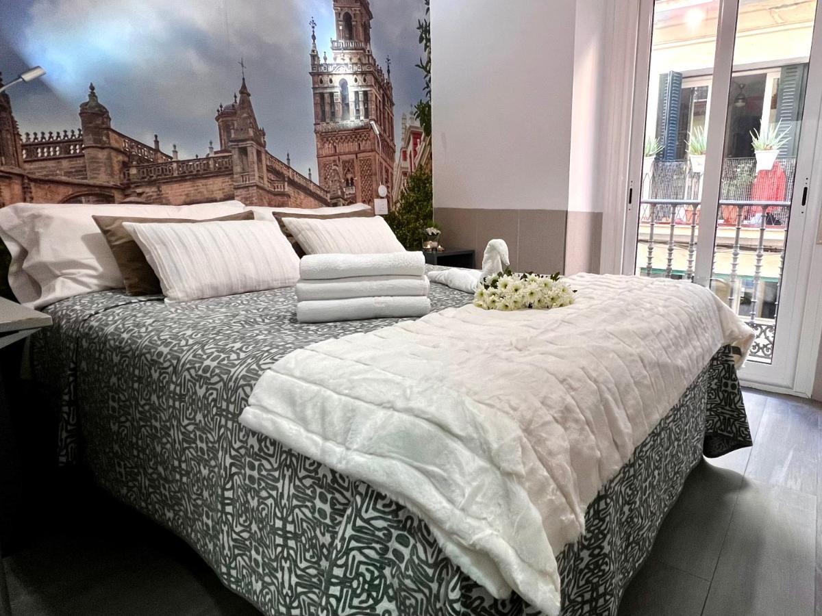 塞维利亚 帕科斯旅馆酒店 外观 照片 A bed with a duvet