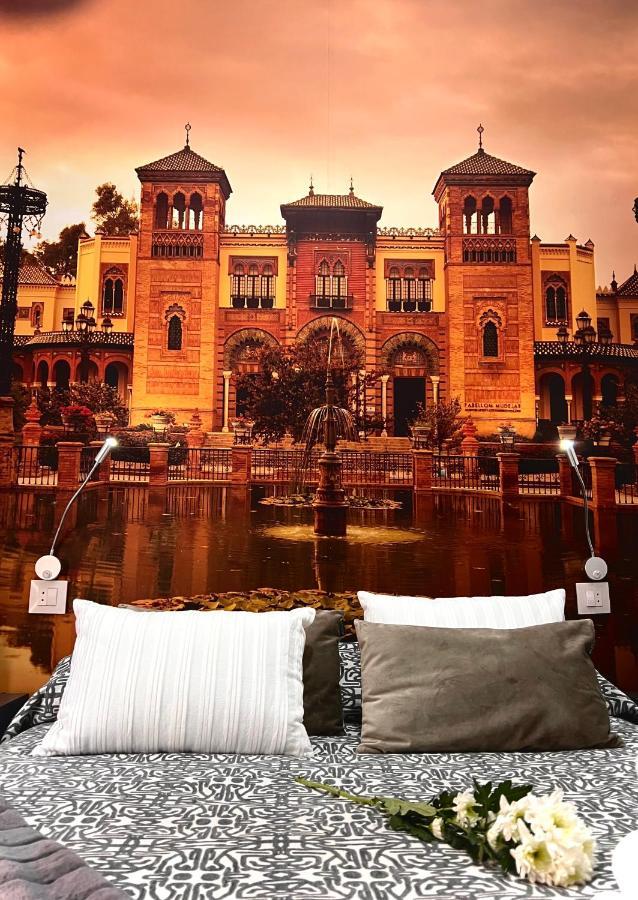 塞维利亚 帕科斯旅馆酒店 外观 照片 The hotel's rooms are decorated with murals of the Alhambra.