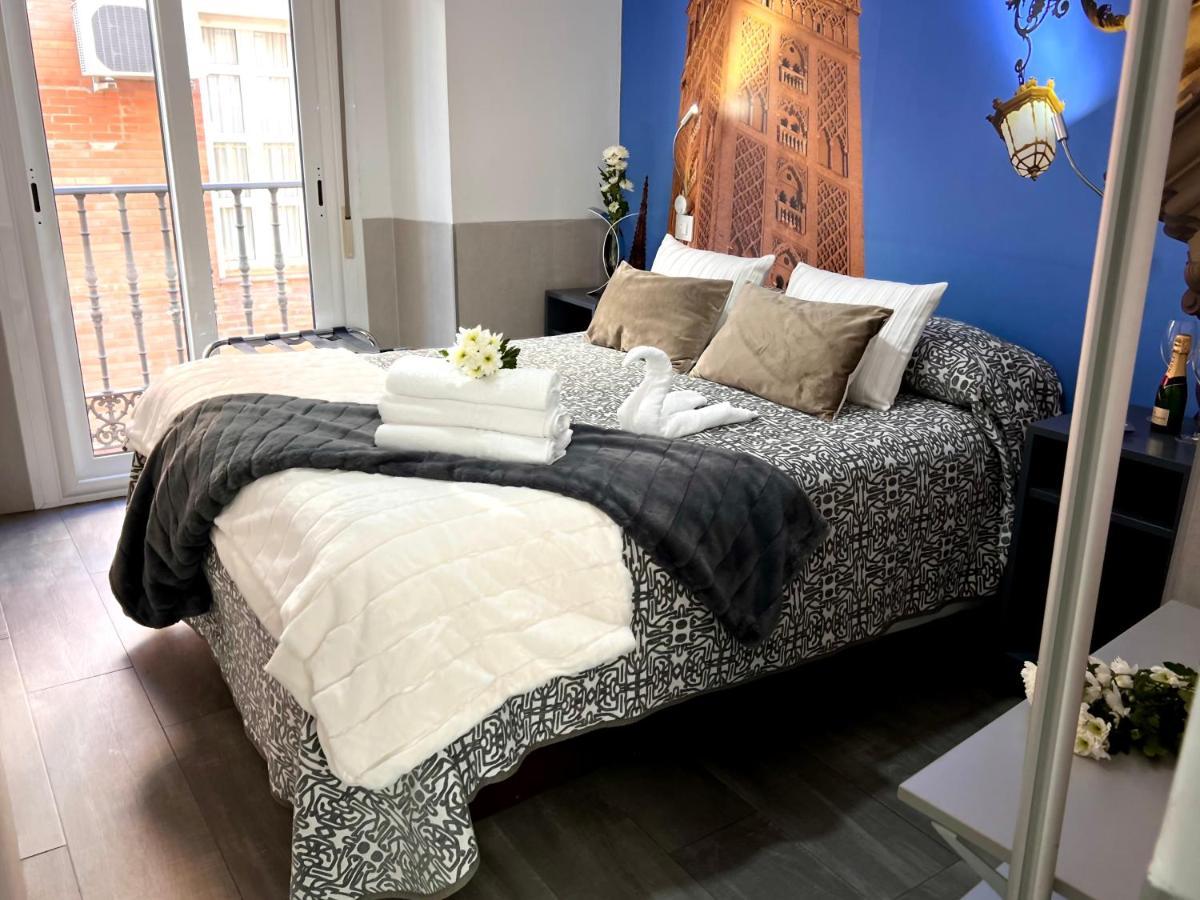 塞维利亚 帕科斯旅馆酒店 外观 照片 A bedroom