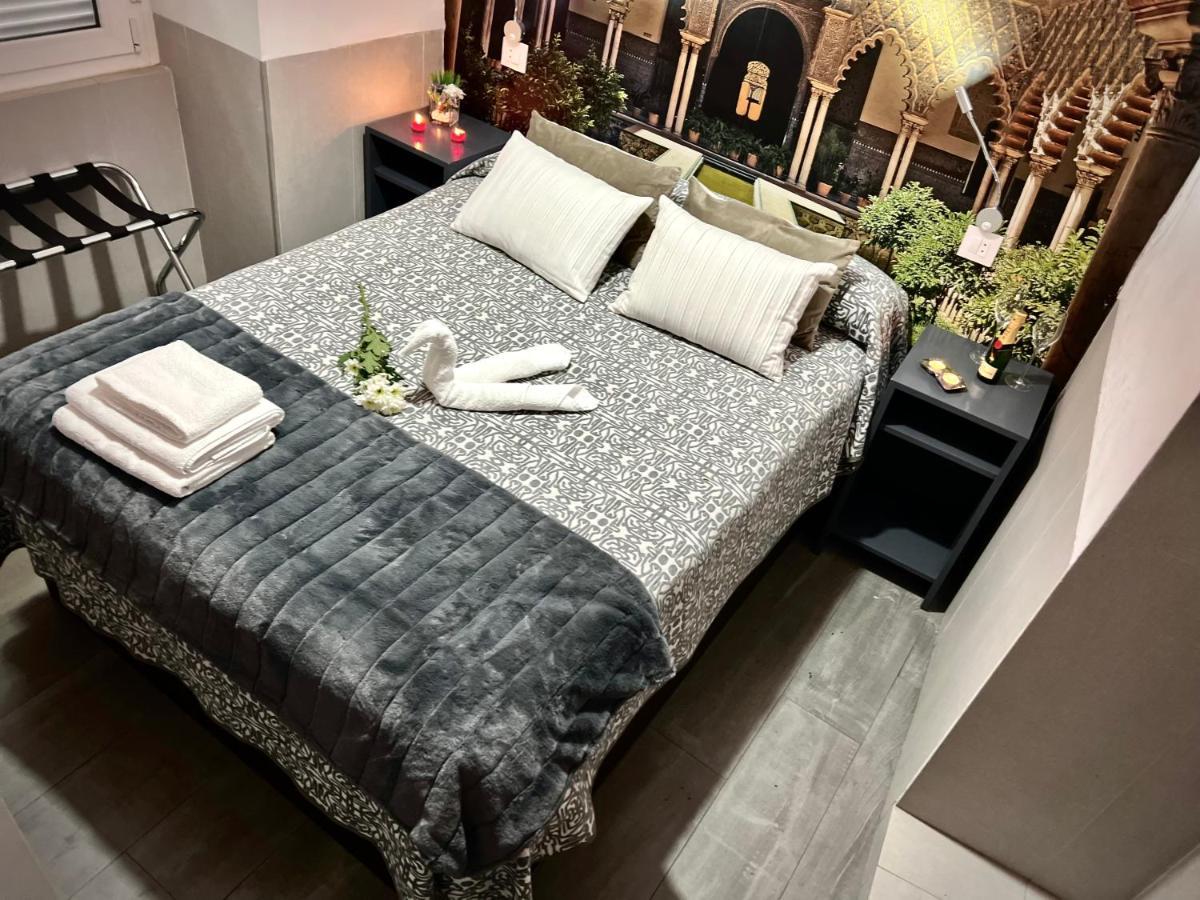塞维利亚 帕科斯旅馆酒店 外观 照片 A bedroom in a hotel