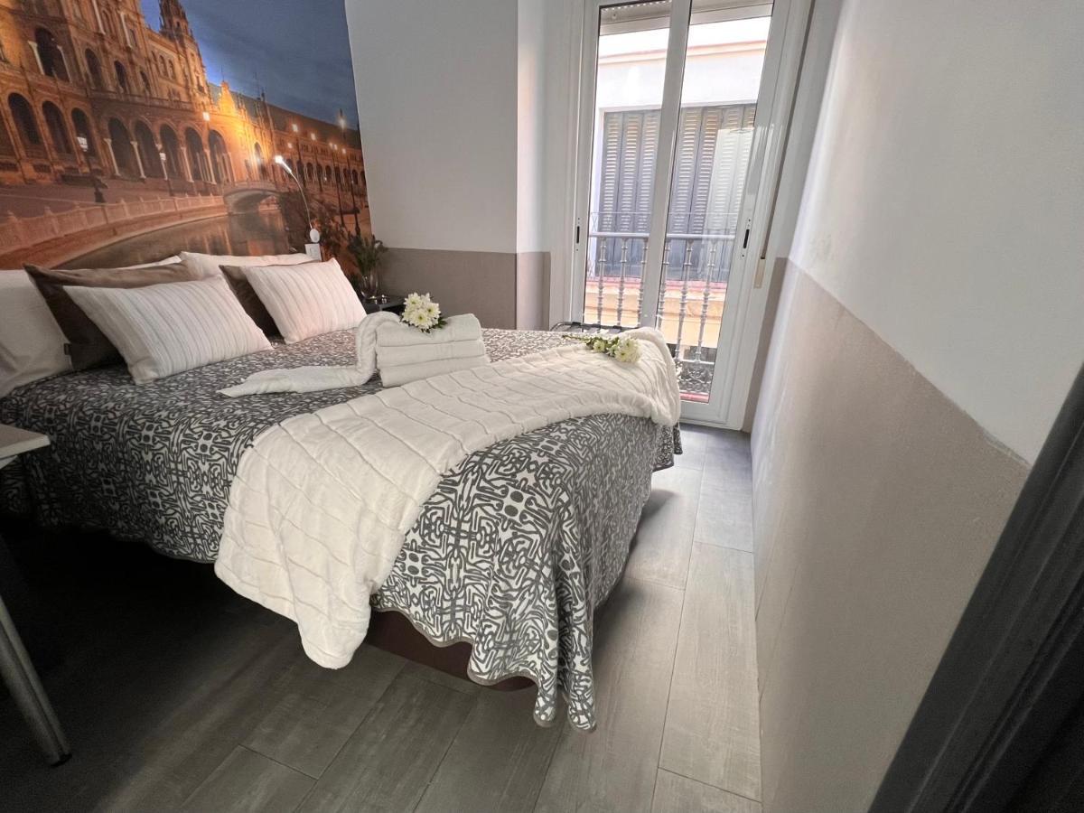 塞维利亚 帕科斯旅馆酒店 外观 照片 A bedroom in the hotel