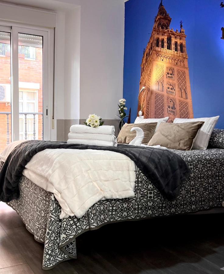 塞维利亚 帕科斯旅馆酒店 外观 照片 A bed with a duvet