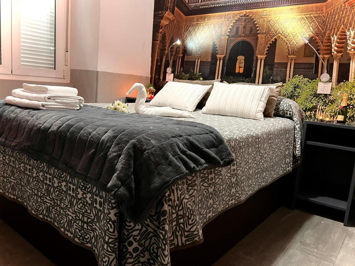 塞维利亚 帕科斯旅馆酒店 外观 照片 A bedroom at the hotel