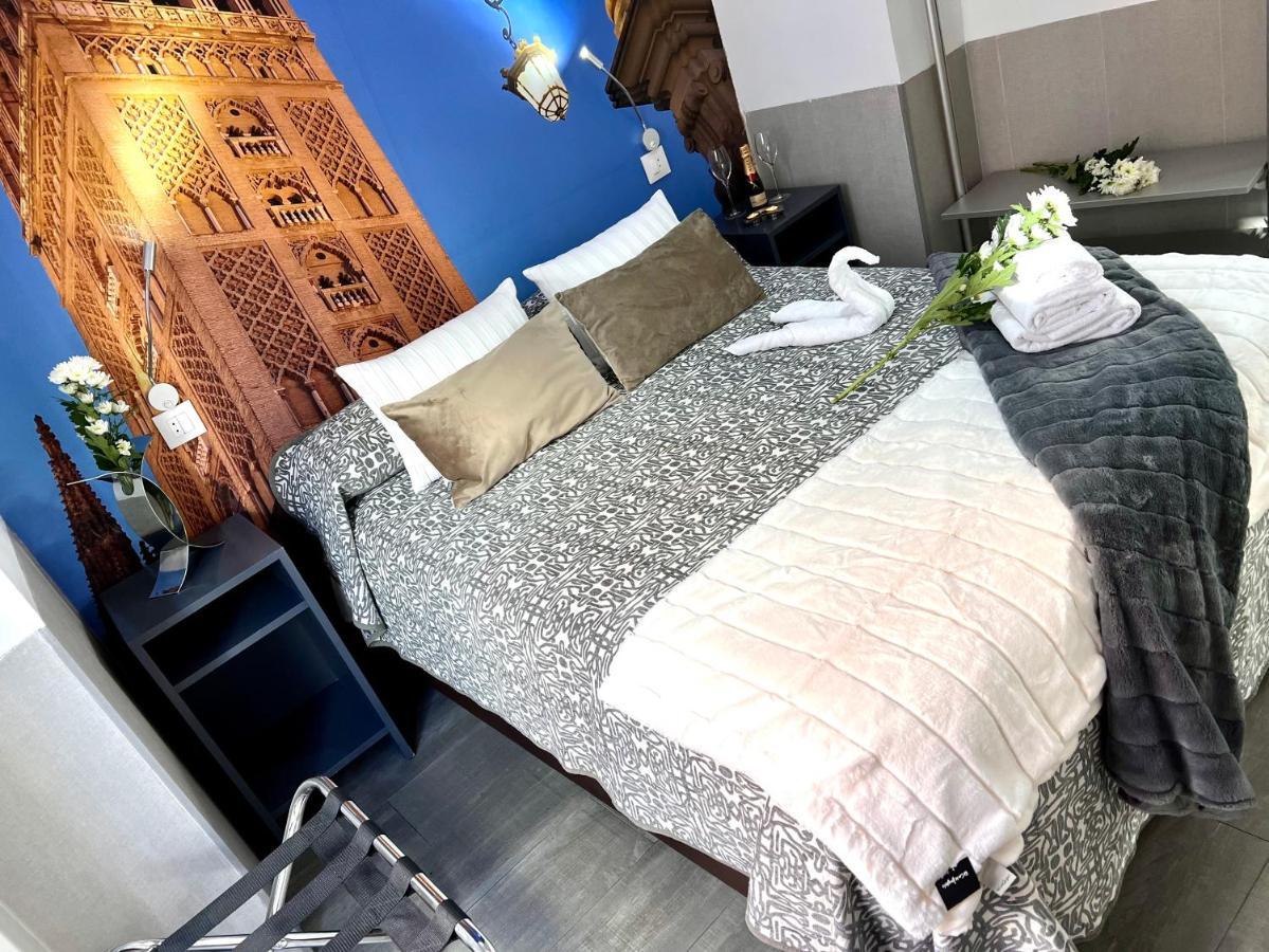 塞维利亚 帕科斯旅馆酒店 外观 照片 A bedroom at the hotel
