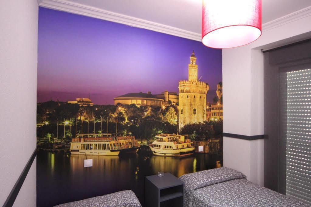 塞维利亚 帕科斯旅馆酒店 外观 照片 A wall mural in a hotel room
